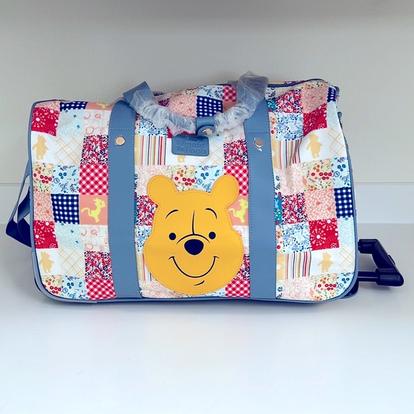Disney Winnie the Pooh Patchwork Rolling duffel Bag with Red and Blue Accents - Picture 1 of 7